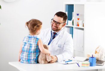 doctor smiling to a child